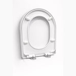 Un abattant wc forme D blanc  debout sur ses fixations 